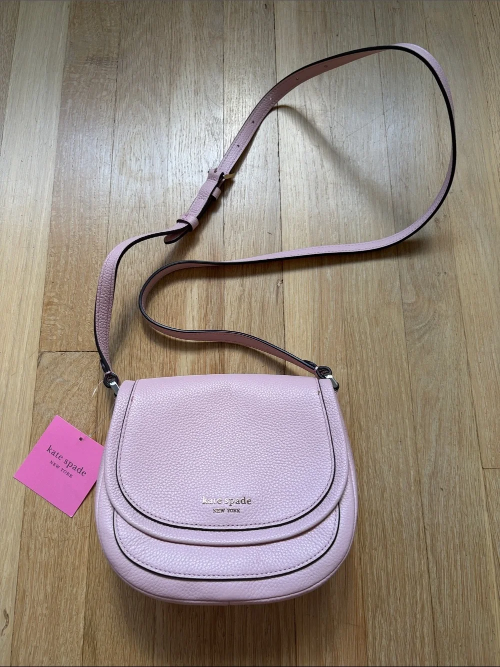 Kate Spade Light Pink Pebbled Leather Saddle Crossbody